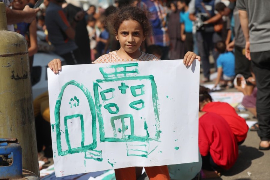 Chùm ảnh khoảnh khắc vui vẻ ngắn ngủi của trẻ em ở Gaza 