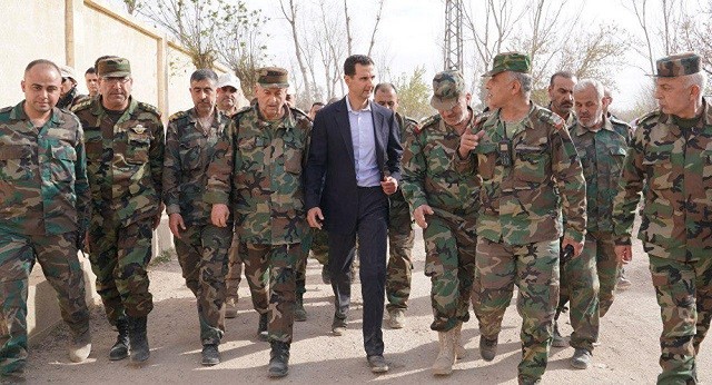 Tổng thống Bashar Assad và các tướng lĩnh quân đội Syria ở Đông Ghouta ngày 18/3 vừa qua