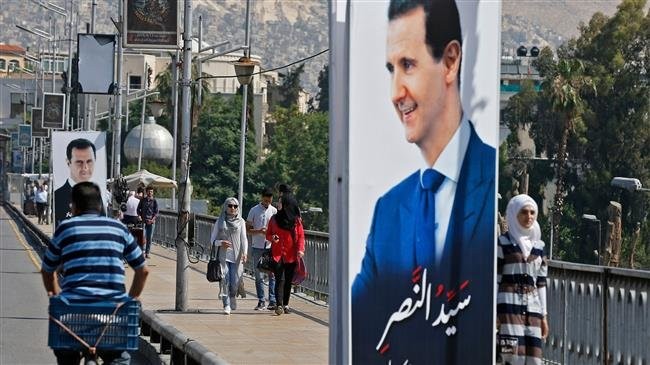 Hình ảnh Tổng thống Syria Bashar al-Assad trên đường phố Damascus, Syria
