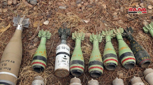 Vũ khí do IS để lại ở al-Qurea.